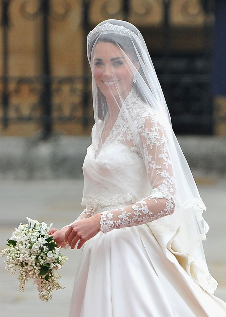 LONDON, ENGLAND - APRIL 29: Catherine Middleton arrives to attend the Royal Wedding of Prince William to Catherine Middleton at Westminster Abbey on April 29, 2011 in London, England. The marriage of the second in line to the British throne is to be led by the Archbishop of Canterbury and will be attended by 1900 guests, including foreign Royal family members and heads of state. Thousands of well-wishers from around the world have also flocked to London to witness the spectacle and pageantry of the Royal Wedding. (Photo by Pascal Le Segretain/Getty Images)
